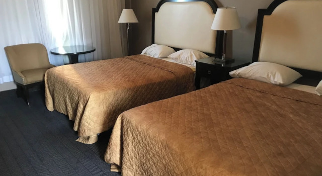 Четырёхместный номер Deluxe с балконом Rainbow Motor Inn - Fallsview