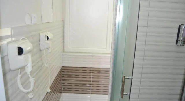 Кровать в общем номере Moon Hostel