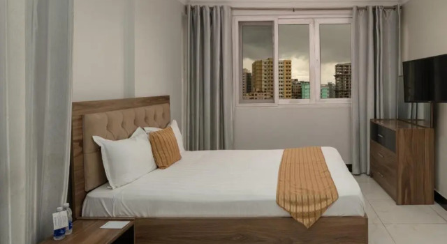 Семейный люкс с 3 комнатами Отель Golden Tulip Dar City Center