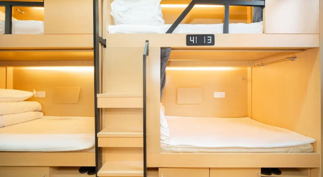 Кровать в общем номере Dunbar Inn Zhenbein Road