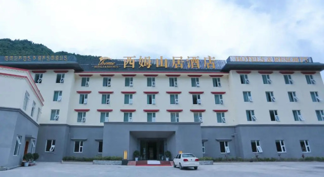Jiuzhaigou Sim Montane Hotel, Rezerwuj Hotel Ngawa Chiny