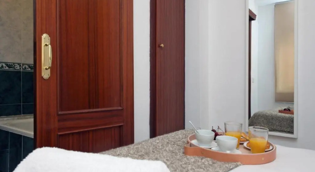 Апартаменты c 1 комнатой SingularStays Mercado Central