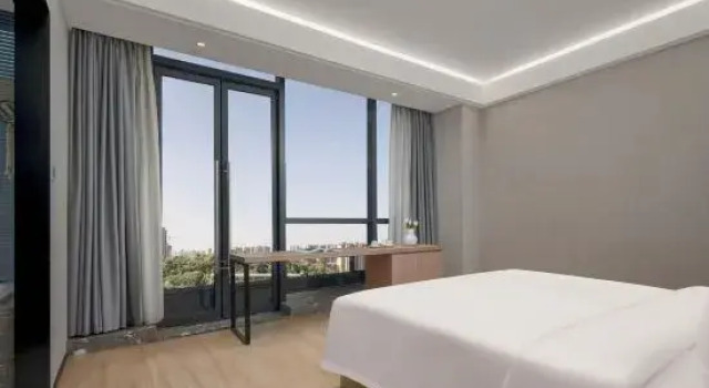 Люкс Lushan Premium Hotel (Sunshine 100 University Town)