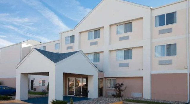 Кровать в общем номере Wingate by Wyndham Sioux City
