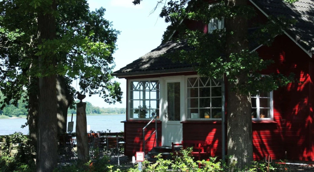 Коттедж с балконом Idyllisches Ferienhaus mit überdachter Terrasse