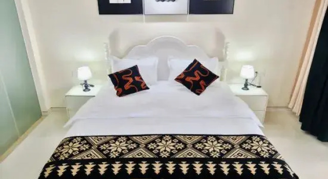 Двухместный люкс с 2 комнатами с видом на море Beihai Huanan Thematic Scenic Apartment (Beihai Golden Beach Beibu Bay No.1)