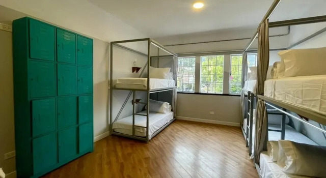 Bed in slaapzaal uitzicht op de bergen Marietta - House of Social Travellers