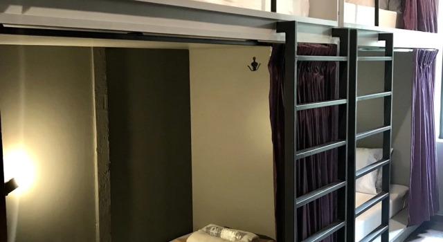 Кровать в общем номере Tian Tian Hostel