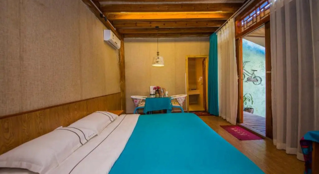 Номер Deluxe Lijiang Rongyi Homestay
