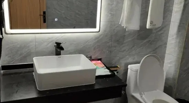 Кровать в общем номере Shangrao Harmonious E-sports Hotel