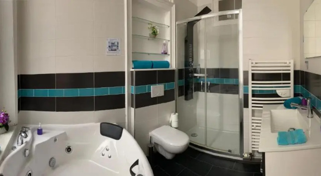 Номер Deluxe Chambres dHôtes Au coin du spa