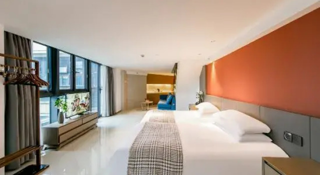 Четырёхместный люкс Дуплекс с видом на город YUN MAN Suites Hotel