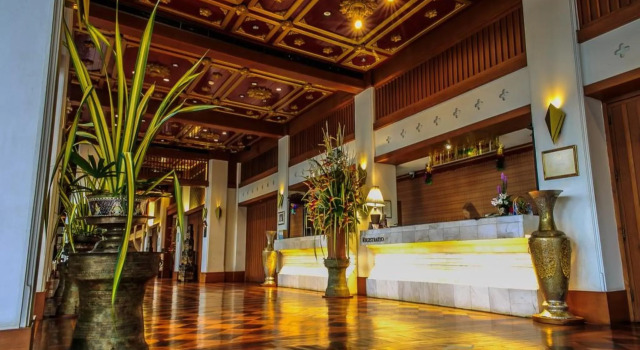Кровать в общем номере Wienglakor Hotel Lampang