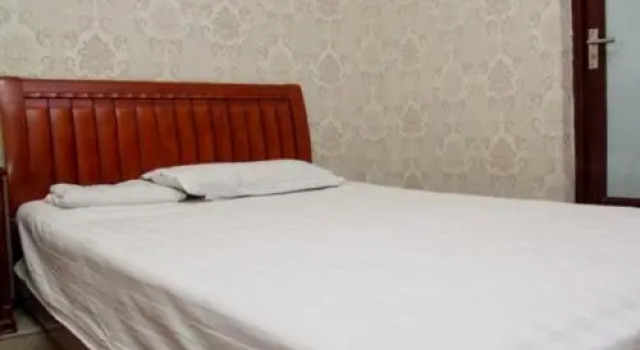 Yichang Ruyi Inn, Book Hotel Hoteller i Yichang med parkering, Parkering