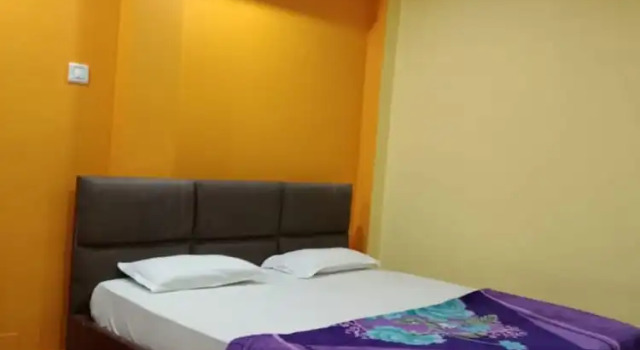 Номер Deluxe Goroomgo Sahoo Palace Puri