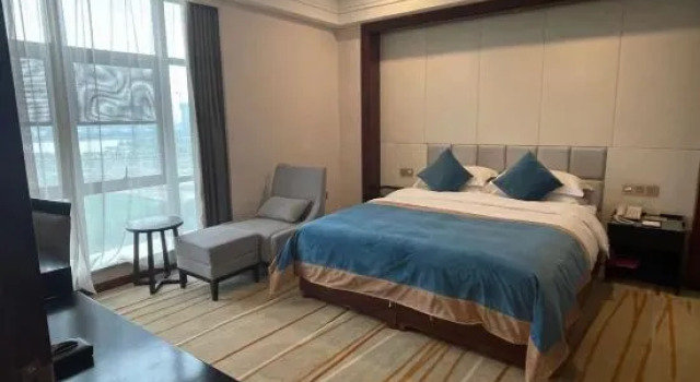 Двухместный люкс Deluxe c 1 комнатой Zhongyuan Sunny International Hotel