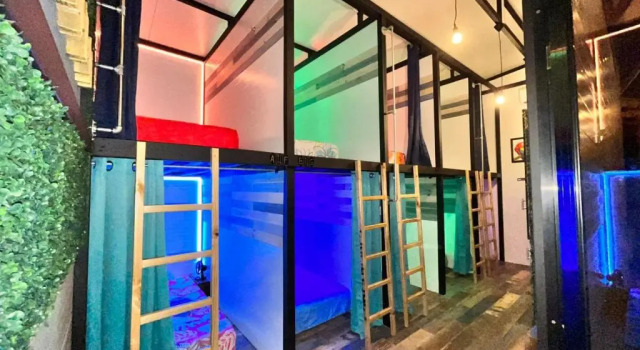 Кровать в общем номере Tucan Hotel