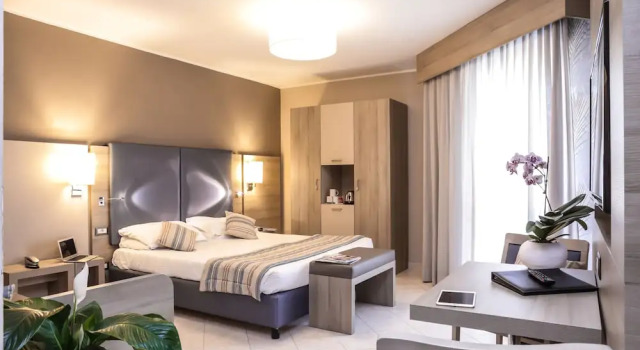 Четырёхместный номер с балконом Alma di Alghero Hotel