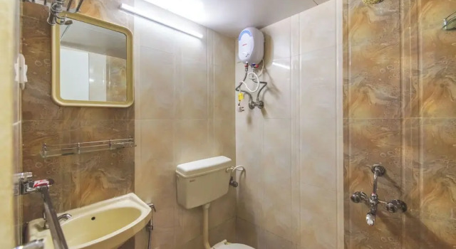 Кровать в общем номере Hotel Nest In