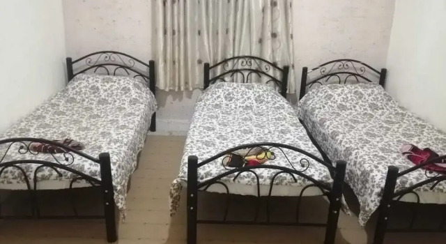 Кровать в общем номере Youth guest house