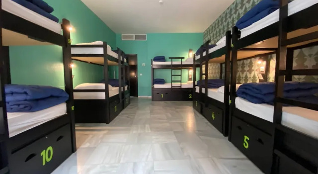 Кровать в общем номере JOY Plaza de Armas