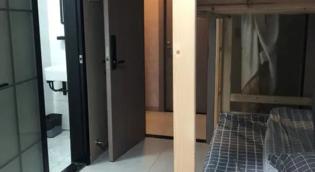 Кровать в общем номере Shanghai Cailutong Hotel