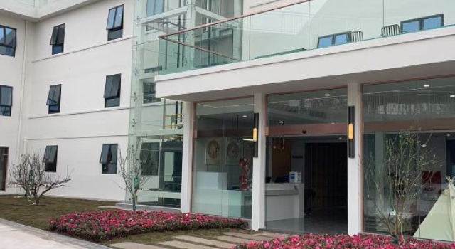 Muxia Leisure Hotel, Rezerwuj Hotel Zigong Sichuan