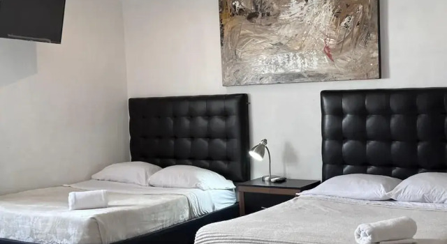 Четырёхместный номер Deluxe Suites Apodaca
