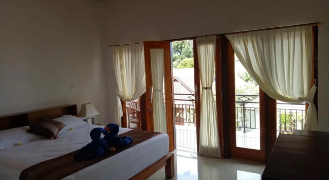 Двухместный номер Deluxe с балконом и с красивым видом из окна Radya Homestay