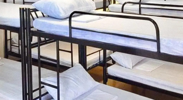 Кровать в общем номере RedDoorz Plus at Billys Resort Oslob