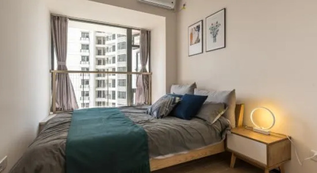 Люкс с 2 комнатами с видом на море Haikou Evergrande Bund Xiaodao Homestay