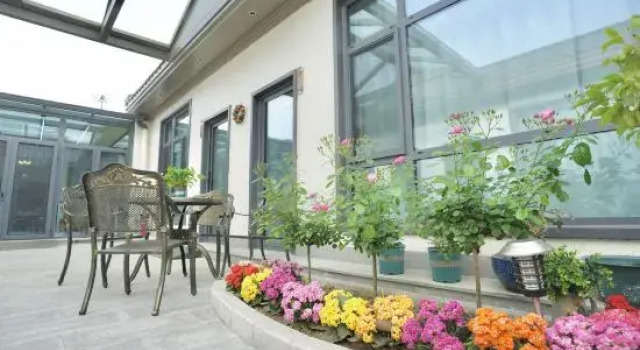 Floral Hotel·Ledong Courtyard, Book Hotel Hoteller i Beijing Province med parkering, Parkering