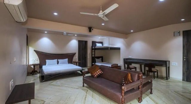 SaffronStays Aura, 4 BR Luxury Pool Villa with Game Room & Lawn