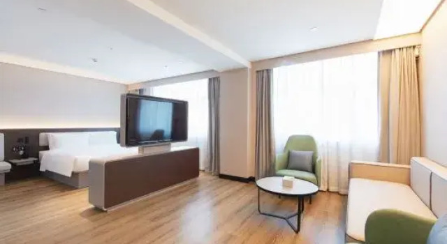 Люкс HanTing Hotel (Yushu Municipal Government)