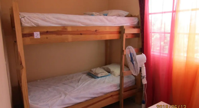 Кровать в общем номере White Sands Bed & Breakfast