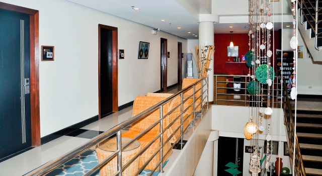 Кровать в общем номере Grande Vista Hotel