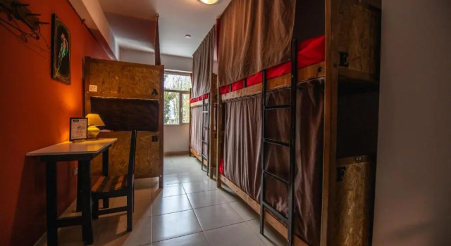 Кровать в общем номере Oshovia Hostel