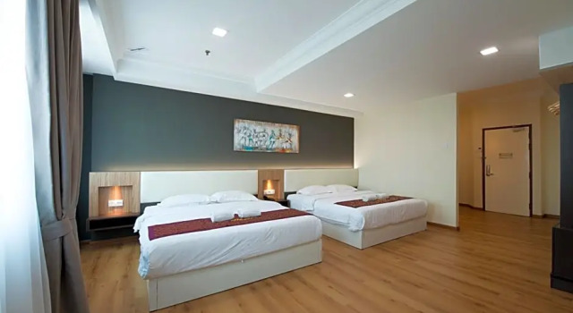 Четырёхместный семейный люкс Collection O Hotel Super Cowboy