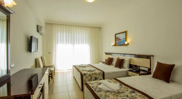 Четырёхместный номер Standard Belcekum Beach Hotel