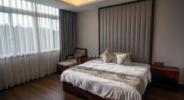 Люкс Deluxe ZhongYao Flower Town Holiday Hotel