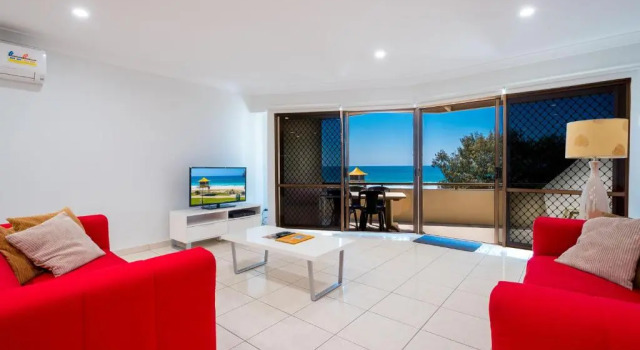 Апартаменты Deluxe Sandrift Beachfront Apartments