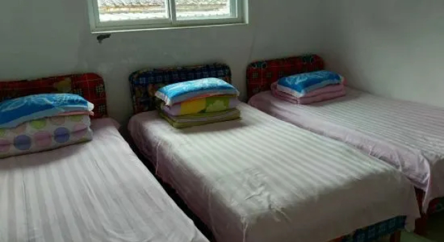 Кровать в общем номере Beijing Tianci Farmhouse