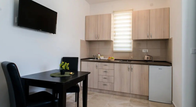 Студия Comfort с видом на сад Apartments Sunrise