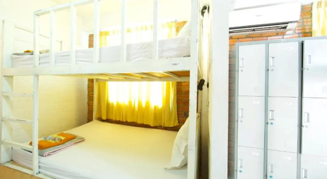 Кровать в общем номере Naga Angkor Hostel