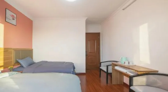 Кровать в общем номере Shanghai Gujia Homestay