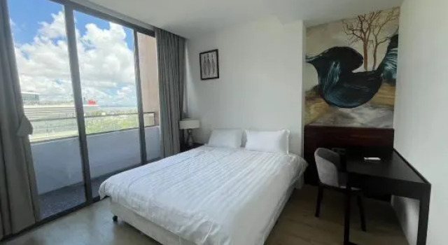 Трёхместный люкс с 2 комнатами с видом на море Baoli JintinShanwei Bay Dongyue Boyang apartment