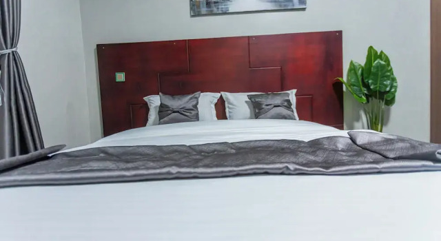 The Den Soroti White