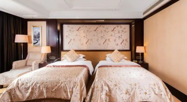 Номер Deluxe Tai Zhou International Jinling Hotel