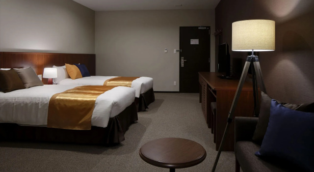Двухместный номер Deluxe Japanese-Style with Bathroom The Yuinchi Hotel Nanjo