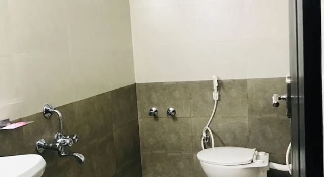 Кровать в общем номере Sharada Residency